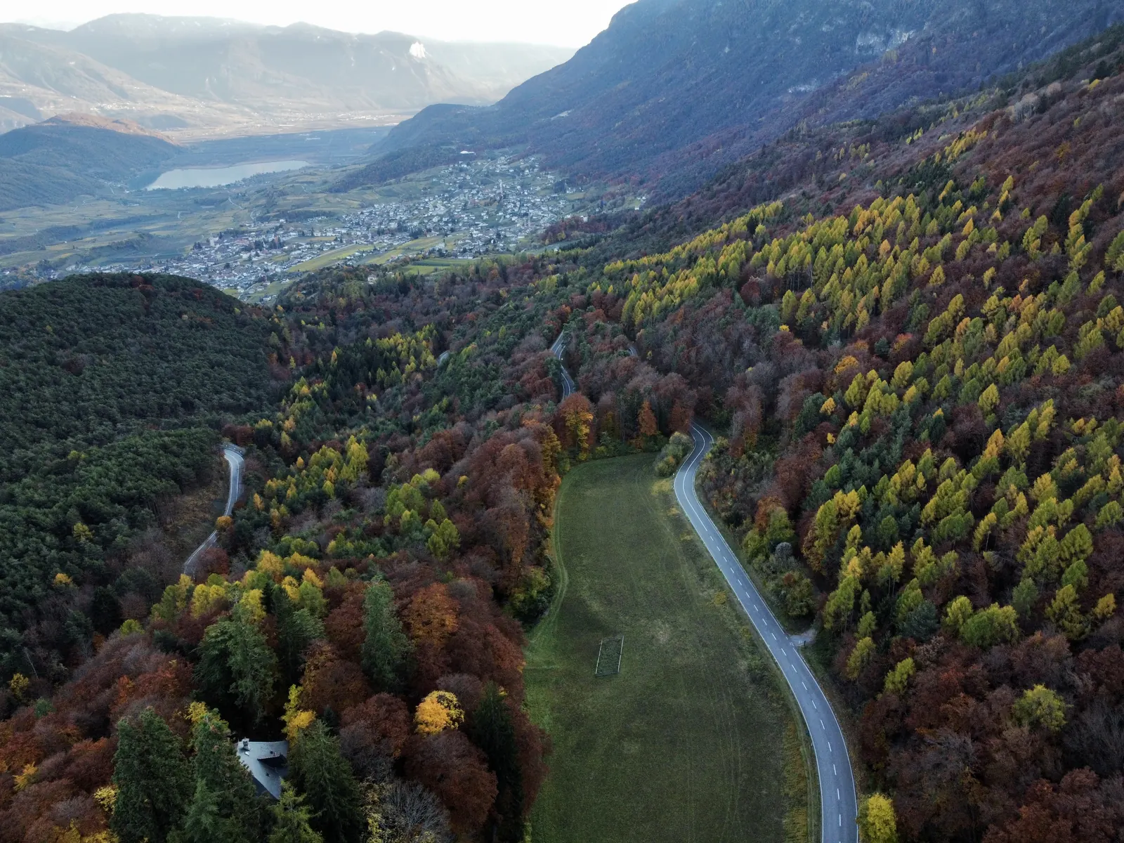 Winding roads through a mountain valley
